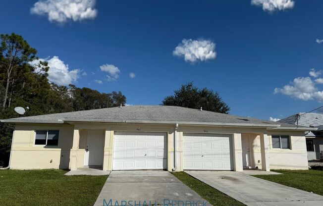 Beautiful wood tile floors! 3 Bed 2 Bath 1 car garage Duplex for rent!