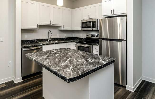 New building with white and dark color schemes with one, two and three bedroom apartment homes at CopperCreek Apartments in Council Bluffs, IA