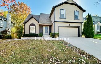 Beautiful Four Bedroom Olathe Home w/ Wood Floors, Granite Counters, Finished Basement and a Fenced Yard!