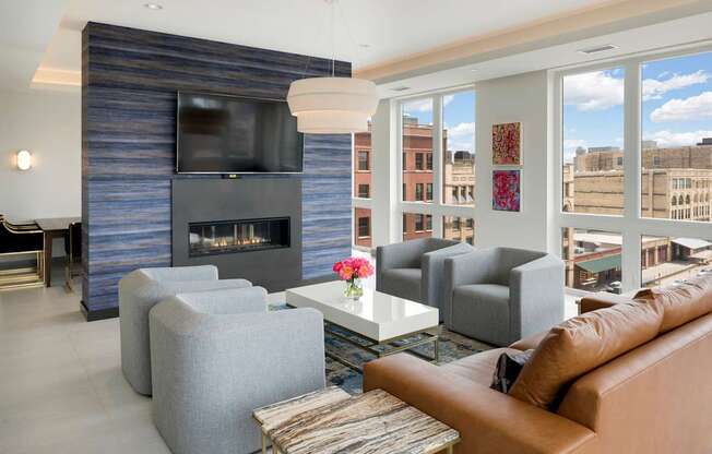 A living room with a fireplace and a couch.