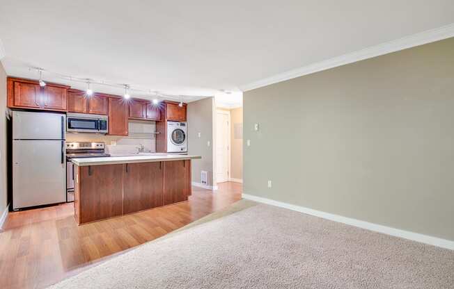Living Room and Hallway at Whispering Brook Apartments, Des Moines, WA
