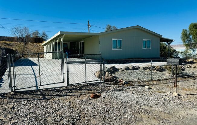 Beautifully Remodeled 4-Bedroom Home with Sunroom and Ample Parking in Bullhead City