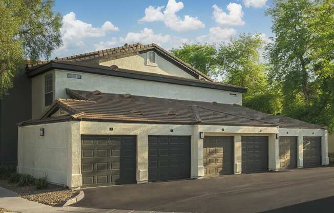 a row of garage doors on the side of a building