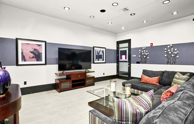 Acadia at Cornerstar Apartments - Resident lounge with multiple flat screen TVs