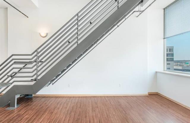 Living room with stairs at Boston Lofts, Milwaukee, WI, 53203