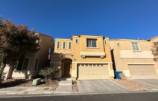 Charming 3 bed/2 bath single-family home in the heart of Blue Diamond! Tiled, downstairs entryway leads to combined kitchen and living room. Upstairs is bathed in natural sunlight, lots of accent windows and wood-rail staircase. Cozy backyard with pavers