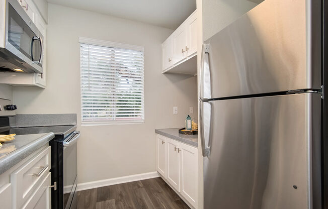 Fridge In Kitchen at St. Charles Oaks Apartments, Thousand Oaks, California