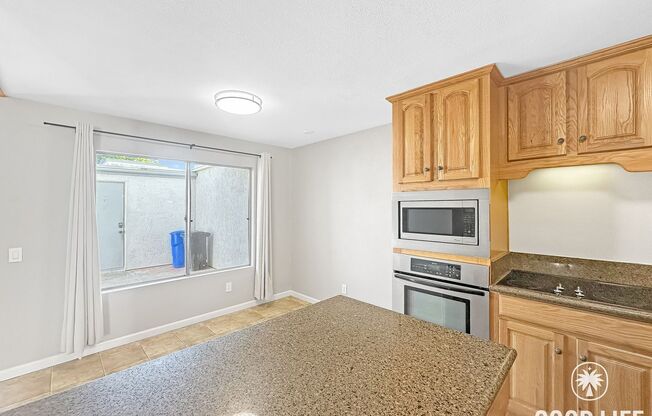 Spacious 3BD/2.5BA Two-Story Condo in Southwest Chula Vista with Kitchen Island, In-Unit Laundry & 2-Car Garage