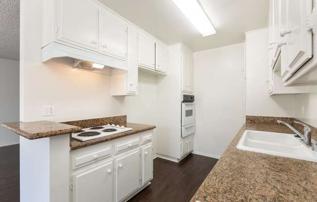 Kitchen with White Appliances and White Cabinets