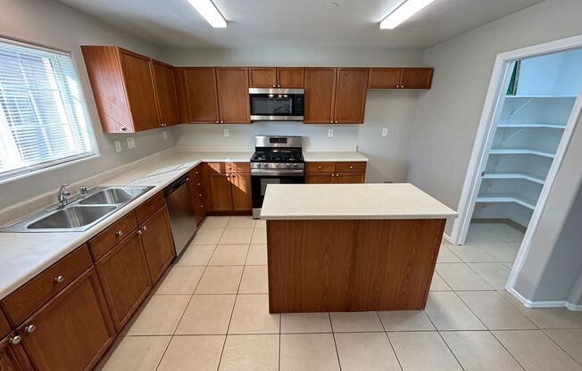 Spacious Tri-Level 4-Bedroom Home with Balcony and Community Amenities in Northwest Las Vegas!