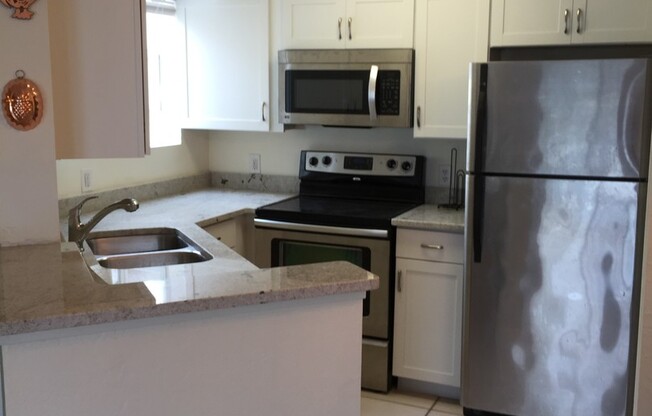 3rd floor upgraded unit just walk in distance to the beach!!