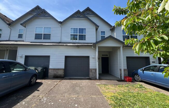 Beautiful Two-Level Townhouse with Gas Fireplace, Vaulted Primary Suite, and Fenced Backyard!