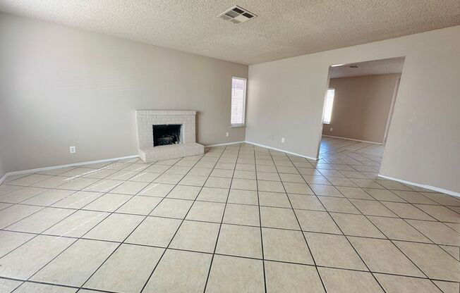 Convenient and centrally located home on a huge lot with separate living room and dining room areas! Walking distance from shopping centers with grocery stores, restaurants, retail, gym, spa, dentist, urgent care, and even the CSN Charleston Campus!