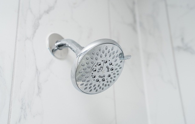 Discover unparalleled luxury at Modera St. Petersburg. Immerse yourself in designer bathrooms featuring premium shower heads.