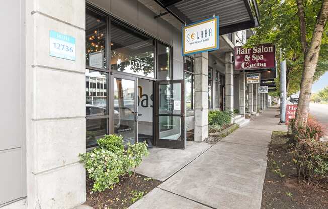 a building with a sign that says hair salon and spa