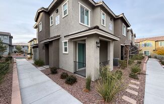 Charming 2 Bedroom, 3 Bath, 2-Story Gated Condo nestled in the beautiful Waverly Community in Henderson!