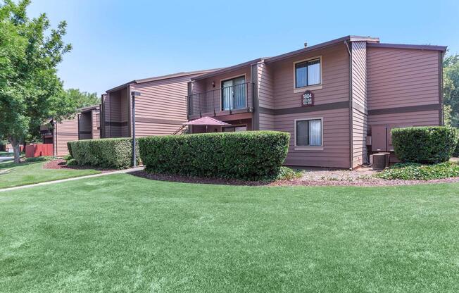 a large lawn in front of a house