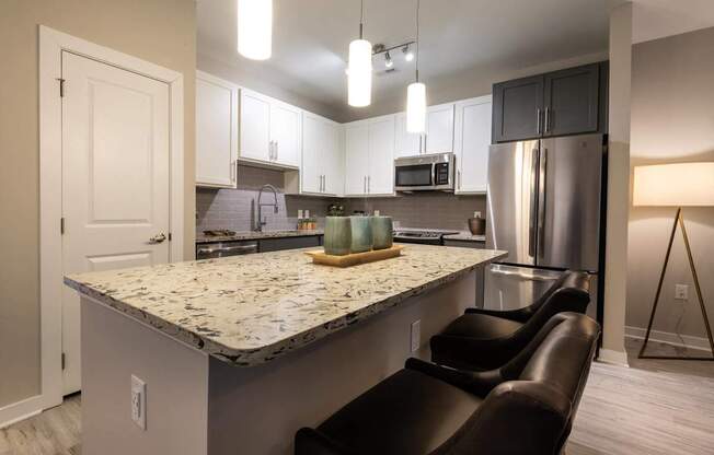 A Kitchen With Refrigerator at The Aster Apartments, Cary, 27519