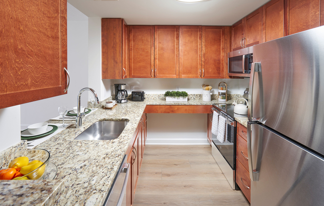 Small footprint, big style. The Belmont kitchen is reimagined with high-end finishes and energy-efficient appliances.
