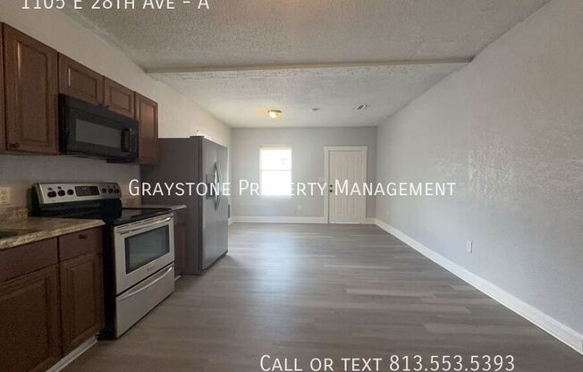 1105 E 28 AVE