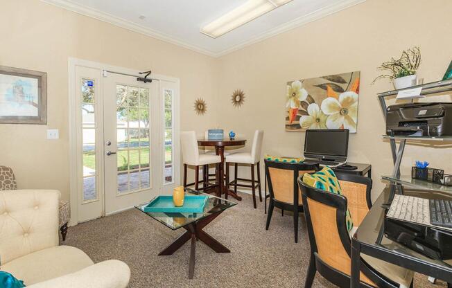 a living room filled with lots of furniture