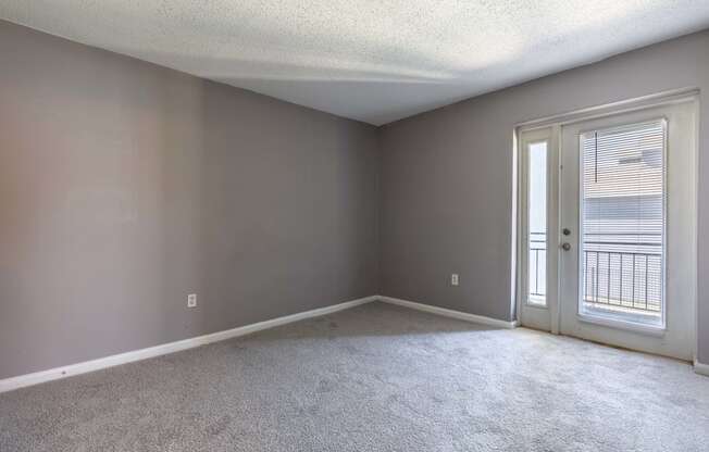 Westchase Apartments in Harvey LA photo of living room with plush carpeting
