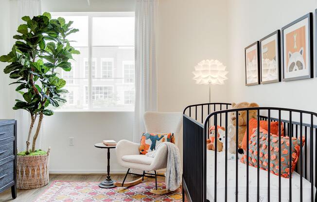 a living room filled with furniture and a large window