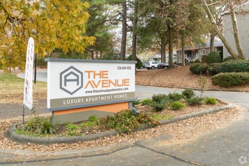 the avenue sign at the entrance of the enclave at laurel apartment homes