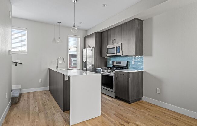 1 bed, 1.5 baths, 748 sqft, $1,650, Unit 5165 W 10th Ave