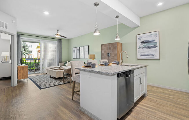 a kitchen with a sink and a counter top