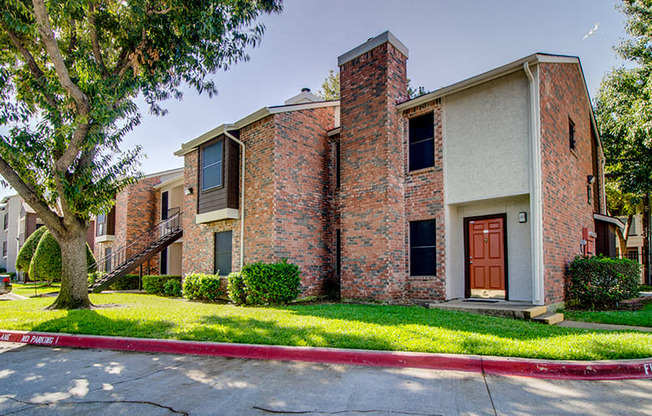 Exterior view of townhome at Timberglen Apts 75287