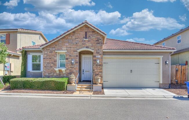 Spacious 3-Bedroom Home with a Backyard in Harlan Ranch Community!