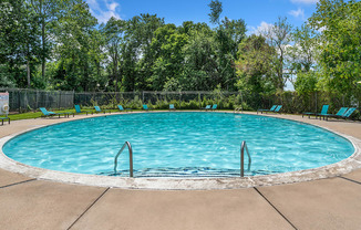 Residents enjoy a refreshing pool, fitness center, and planned community events.
