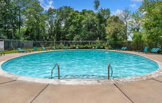 Residents enjoy a refreshing pool, fitness center, and planned community events.