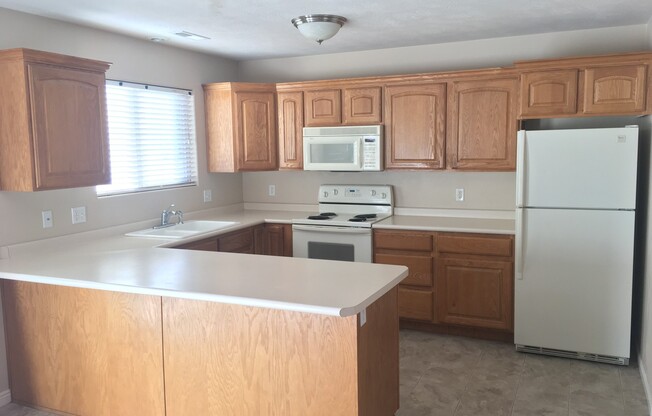 3 bed 2.5 bath town home for rent with new flooring and fresh paint!