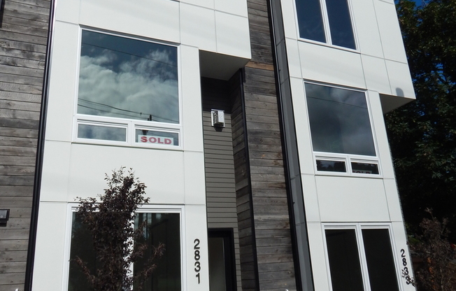 3 bd 2.5 bath Lower Queen Anne townhouse wtih 2 parking spaces.  Bedroom and Bathroom at 1st floor