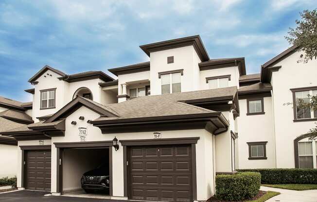 car sitting in garage in front of apartments at Lake Nona Water Mark