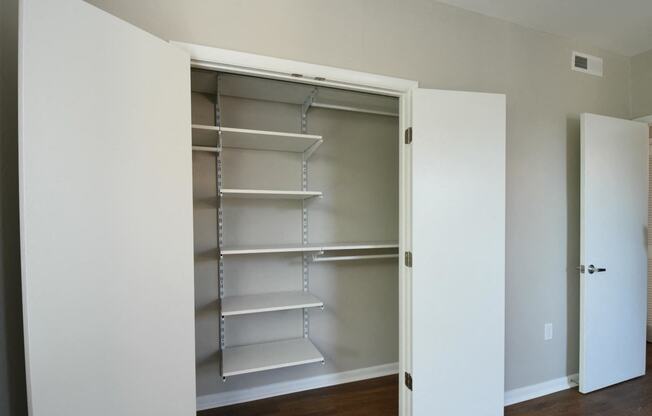 a walk in closet in a 555 waverly unit