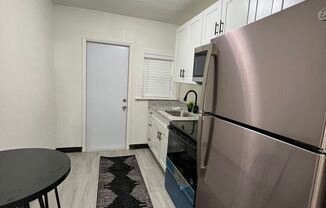 140 NW 13th st = Property