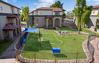 Community Dog Park with Agility Equipment at Stillwater Apartments in Glendale, AZ.