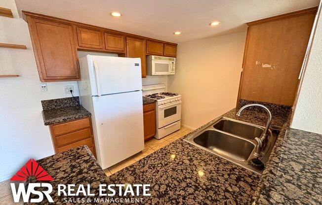 Upper-Level Condo In Gated Community!