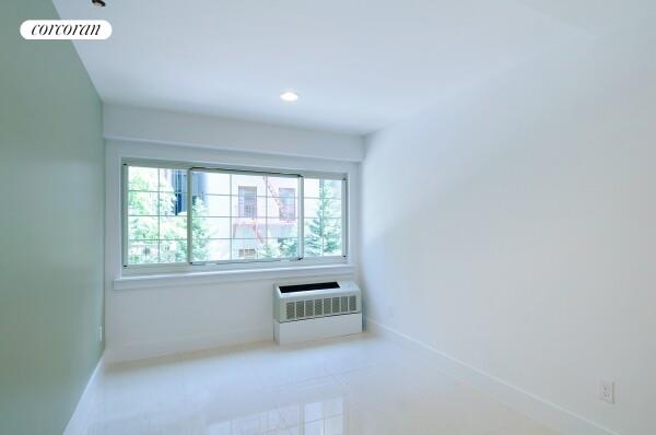 207 W 115 ST