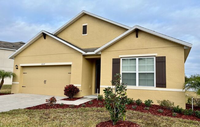Modern 4 bed/2 bath home with brand-new flooring!