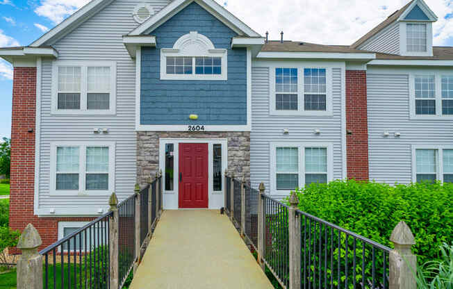 Elegant Entrance To Exterior Building at West Hampton Park Apartment Homes, Elkhorn