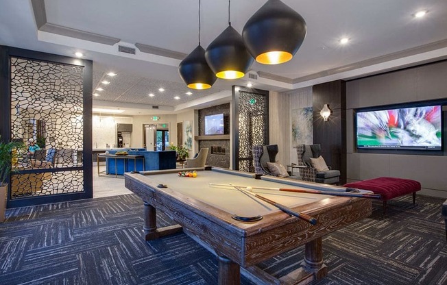 Game Room with Pool Table at The Flats at Ballantyne Apartments, Charlotte, North Carolina