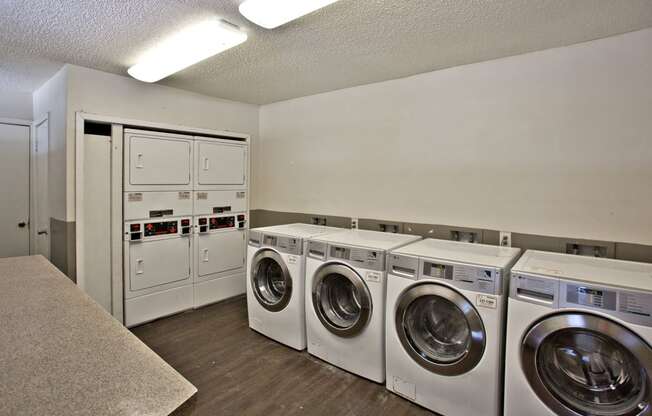 the preserve at ballantyne commons laundry room with washes and dryers