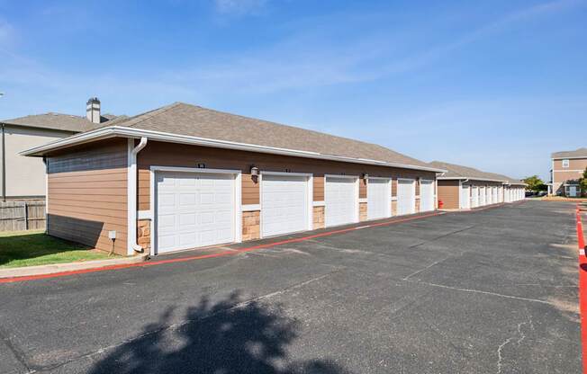 A long row of garage doors are closed.
