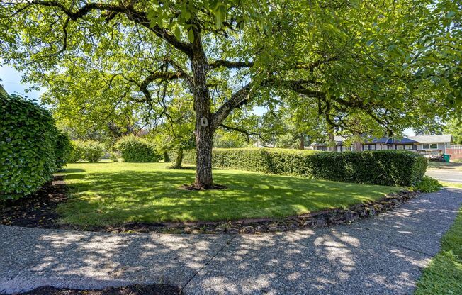 Historic 4-Bedroom Stone Home with Timeless Character, Hardwood Floors, Spacious Living & a Large Private Yard