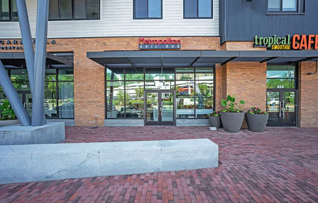 The entrance to a building with a sign that reads