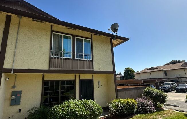 Spacious 3BR/2.5BA updated 2-story townhouse for rent with fenced patio, 2 parking spaces and more